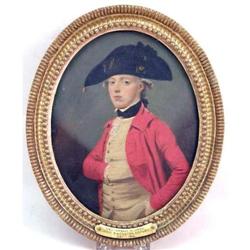 A FRAMED OVAL OIL ON CANVAS