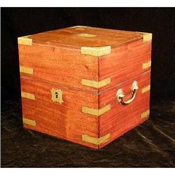 A MAHOGANY AND BRASS MOUNTED TANTALUS