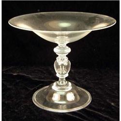 A STEUBEN COLORLESS GLASS FOOTED COMPOTE
