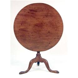 A GEORGE I CARVED MAHOGANY TILT-TOP TEA TABLE