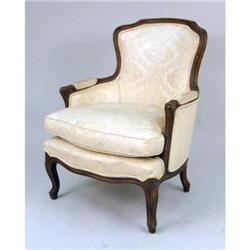 A SILK BROCADE UPHOLSTERED FRENCH PROVINCIAL BERGERE