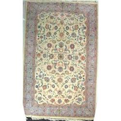 A KASHAN RUG IN PASTEL TONES
