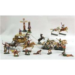 A GROUP OF POLYCHROME-DECORATED COWBOY AND INDIAN FIGURES