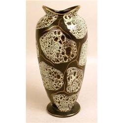 A CERAMIC PARCEL-GILT DECORATED URN-FORM VASE