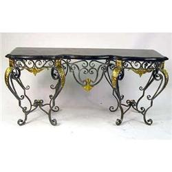 A BAROQUE-STYLE BRASS-MOUNTED. STEEL-AND-MARBLE- VENEERED-TOP SERPENTINE-FRONT CONSOLE