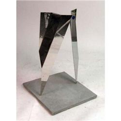 AN ABSTRACT POLISHED MIRRORED STAINLESS STEEL SCULPTURE
