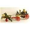 Image 1 : A CAST IRON POLYCHROME PAINT-DECORATED FIRE PUMPER TOY