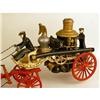 Image 3 : A CAST IRON POLYCHROME PAINT-DECORATED FIRE PUMPER TOY