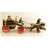 Image 4 : A CAST IRON POLYCHROME PAINT-DECORATED FIRE PUMPER TOY