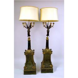 A PAIR OF NEOCLASSICAL PARCEL-GILT BRONZE AND CARVED WOOD SIX-LIGHT TORCHERES