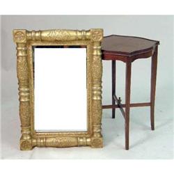 A CLASSICAL GILTWOOD LOOKING GLASS