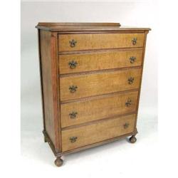 A COLONIAL REVIVAL FIGURED MAPLE TALL CHEST OF DRAWERS