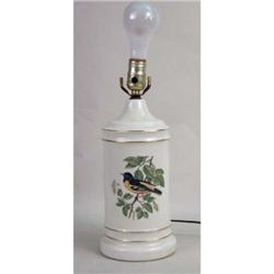 A POLYCHROME PARCEL-GILT DECORATED PORCELAIN LAMP