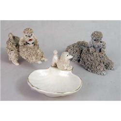 A GROUP OF THREE PORCELAIN POODLES