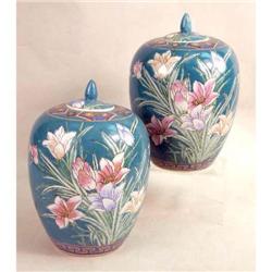 A MATCHED PAIR OF POLYCHROME-DECORATED PORCELAIN GINGER JARS