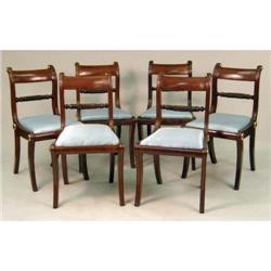 A SET OF SIX REGENCY CARVED AND INLAID WOOD SIDE CHAIRS
