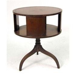 A REGENCY-STYLE LEATHER-INSET MAHOGANY DRUM TABLE