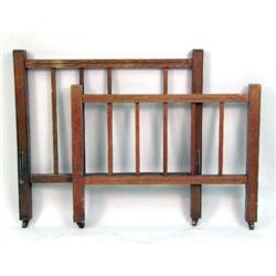 A PAIR OF QUARTER SEWN OAK BEDSTEADS