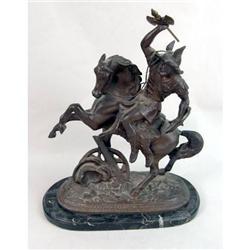 A BRONZE-PATINATED WHITE-METAL SCULPTURE OF A GERMANIC WARRIOR ON HORSEBACK
