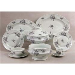 AN ASSEMBLED LIMOGES DINNER SERVICE