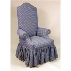 A BLUE COTTON-UPHOLSTERED HIGH-BACK ARMCHAIR