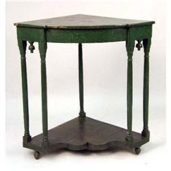 A GREEN-PAINTED TRIANGULAR CORNER TABLE