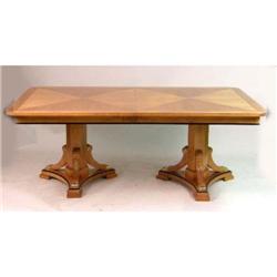 A NEOCLASSICAL-STYLE BRASS-MOUNTED BIRCH TWO-PEDESTAL DINING TABLE