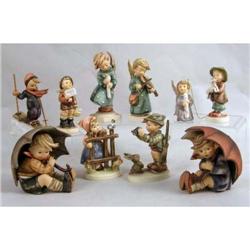 A GROUP OF TEN HUMMEL FIGURINES