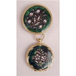AN ANTIQUE YELLOW GOLD AND GREEN ENAMEL TWO PIECE PENDANT WATCH
