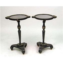 A PAIR OF EBONIZED AND GILT METAL MOUNTED REGENCY STYLE MIRRORED STANDS
