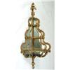 Image 1 : A LOUIS XVI STYLE GILT ROCOCO MIRRORED HANGING OPEN CORNER DISPLAY SHELVES