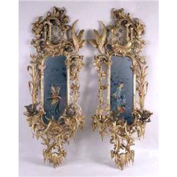 A PAIR OF ORIENTAL STYLE PIERCED CARVED GILT WOOD WALL MIRRORS