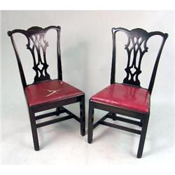 A SET OF EIGHT MAHOGANY CHIPPENDALE STYLE DINING CHAIRS
