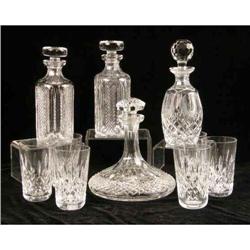 A GROUP OF WATERFORD CUT GLASS BARWARE
