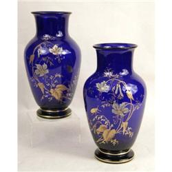 A PAIR OF VICTORIAN FLORAL GILT PAINTED COBALT BLOWN GLASS VASES