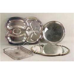 A GROUP OF FOUR METAL TRAYS