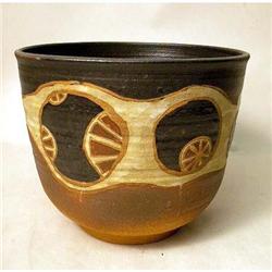 A POLYCHROME GLAZED AND LEMON-DECORATED REDWARE DEEP BOWL