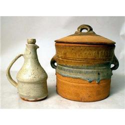 A GLAZED REDWARE STOPPERED DECANTER
