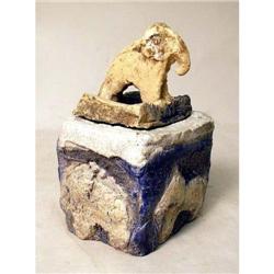 A POLYCHROME GLAZED AND ELEPHANT-DECORATED EARTHENWARE COVERED BOX