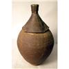 Image 1 : A BROWN GLAZED REDWARE VASE
