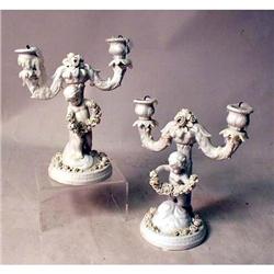 A PAIR OF BLANC DE CHINE FIGURAL TWO-LIGHT CANDELABRA