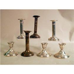 A GROUP OF STERLING SILVER CANDLESTICKS