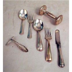 A GROUP OF STERLING SILVER YOUTH FLATWARE