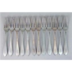 A SET OF TWELVE TIFFANY & CO. "FANEUIL" (1910) PATTERN STERLING SILVER DINNER FORKS