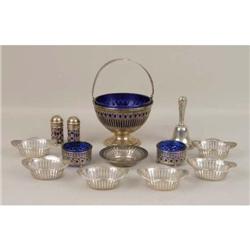 A GORHAM STERLING SILVER RETICULATED HANDLED SUGAR BASKET