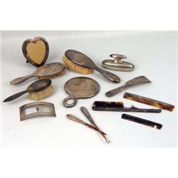 A LARGE GROUP OF STERLING SILVER HANDLED DRESSER ITEMS