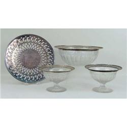 A PAIR OF STERLING SILVER MOUNTED GLASS FOOTED COMPOTES