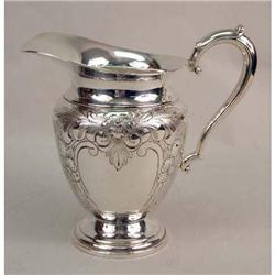 A FRANK WHITING STERLING SILVER WATER PITCHER