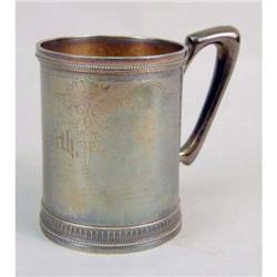 A TIFFANY & CO STERLING SILVER HANDLED MUG