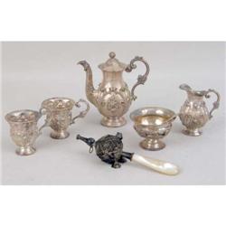 A VICTORIAN MOTHER-OF-PEARL HANDLED SILVER BABY RATTLE